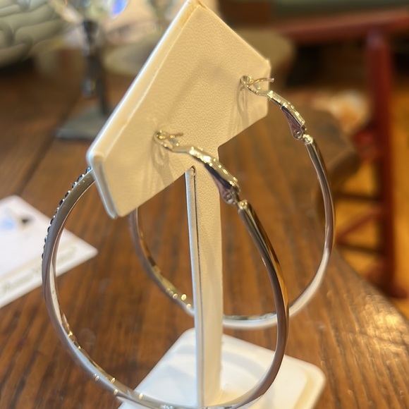 Large rhodium hoops with striking black Swarovski crystals. - Picture 4 of 7